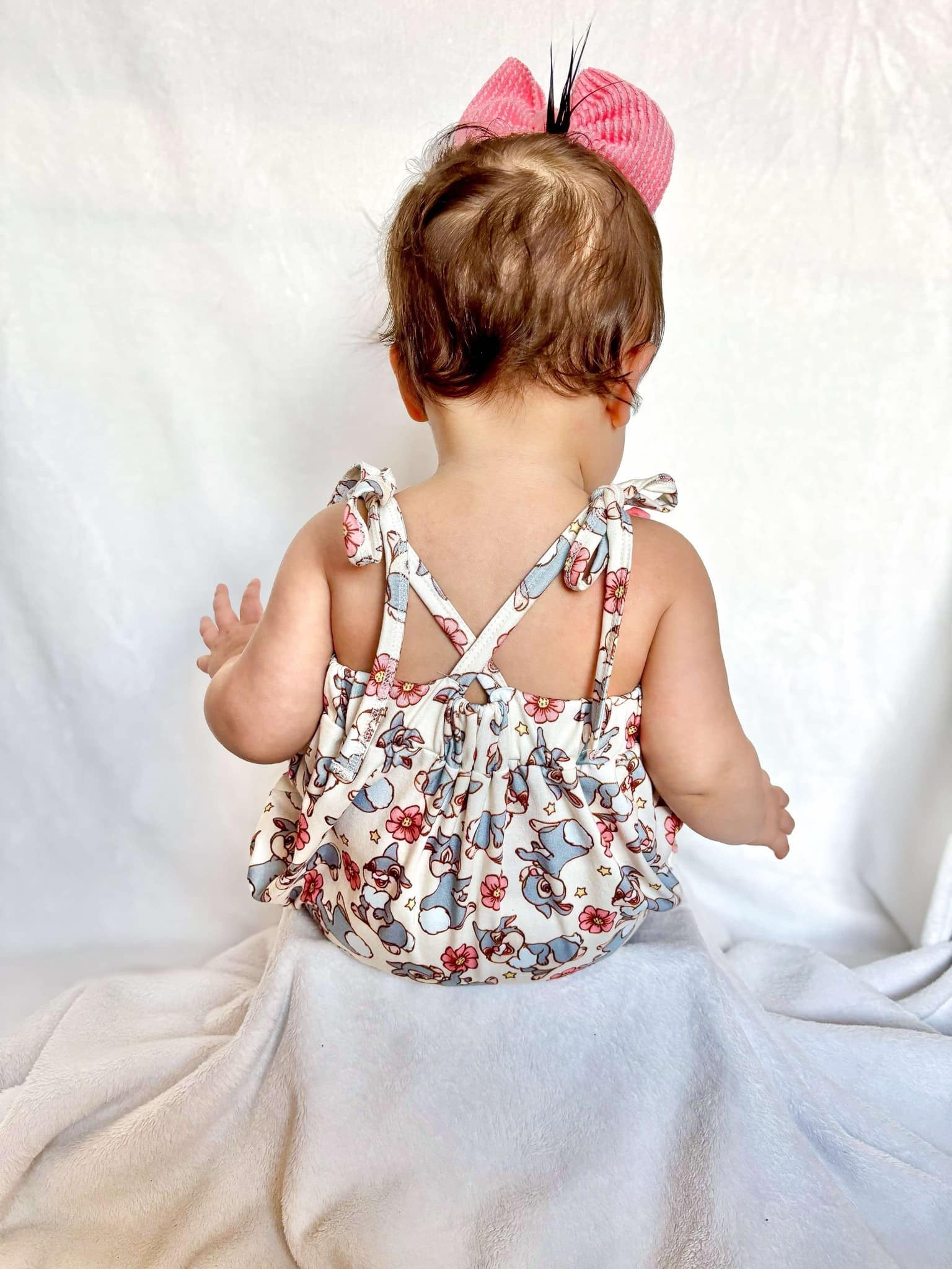Smocked happy easter thumper tie romper