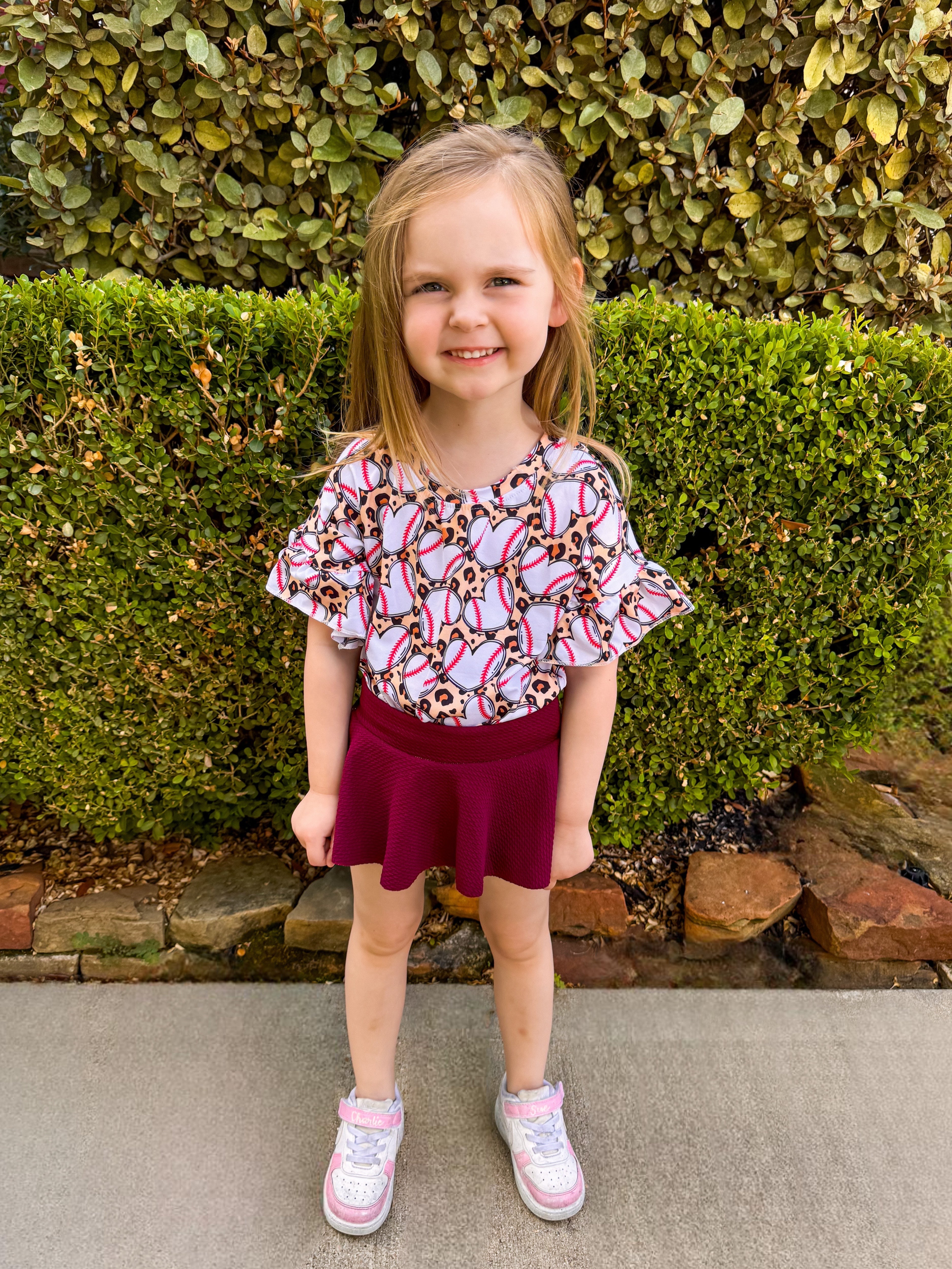 Leopard baseball ruffle top