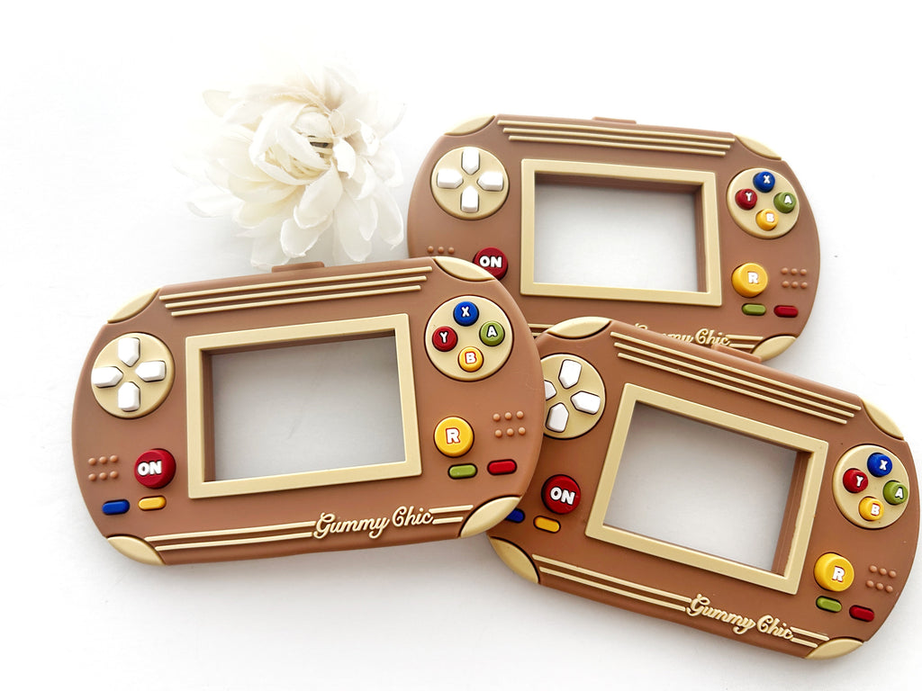 Gummy Chic Video Game Silicone Teether: Nostalgic & Safe Choice