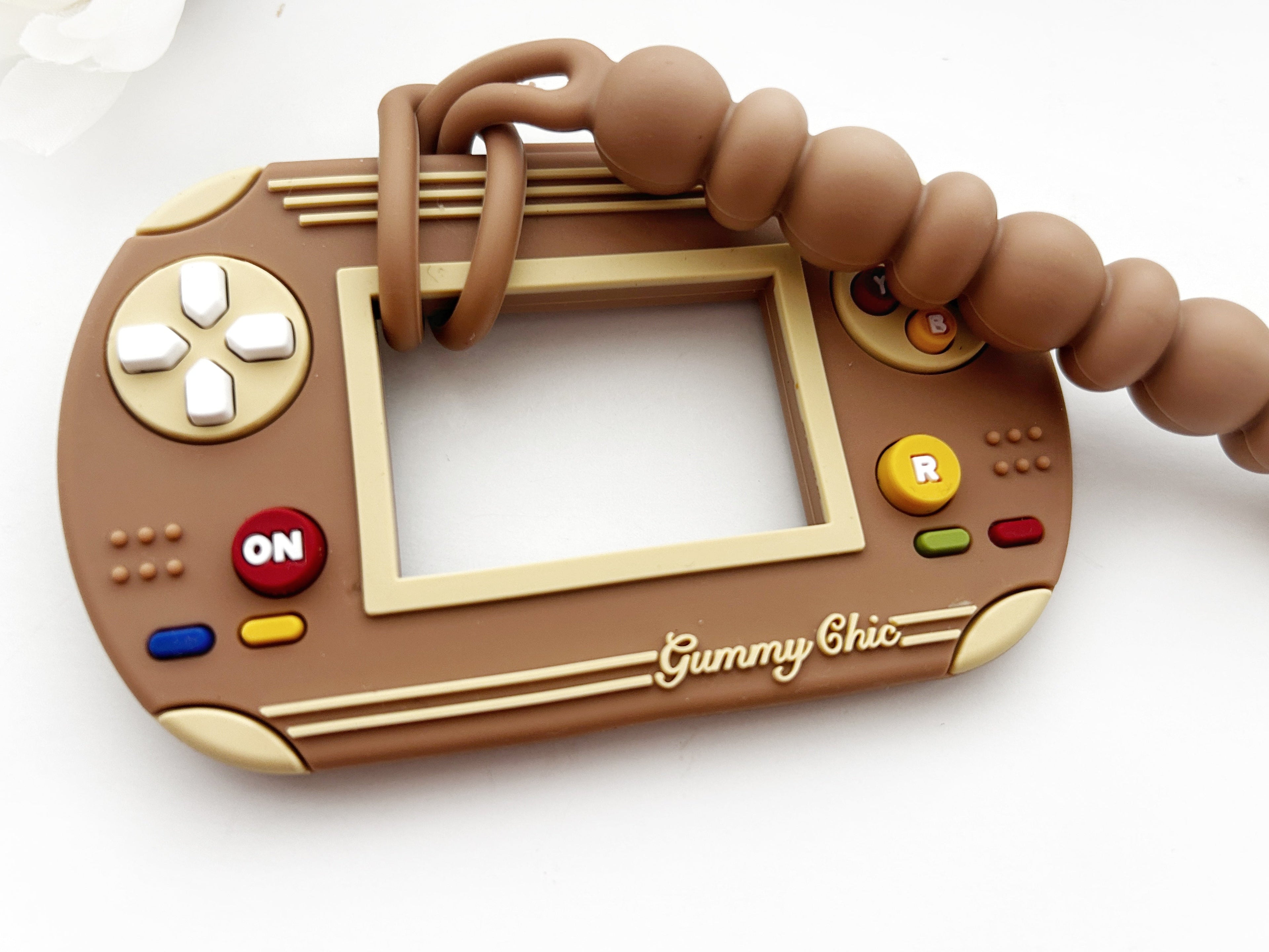 Gummy Chic Video Game Silicone Teether: Nostalgic & Safe Choice
