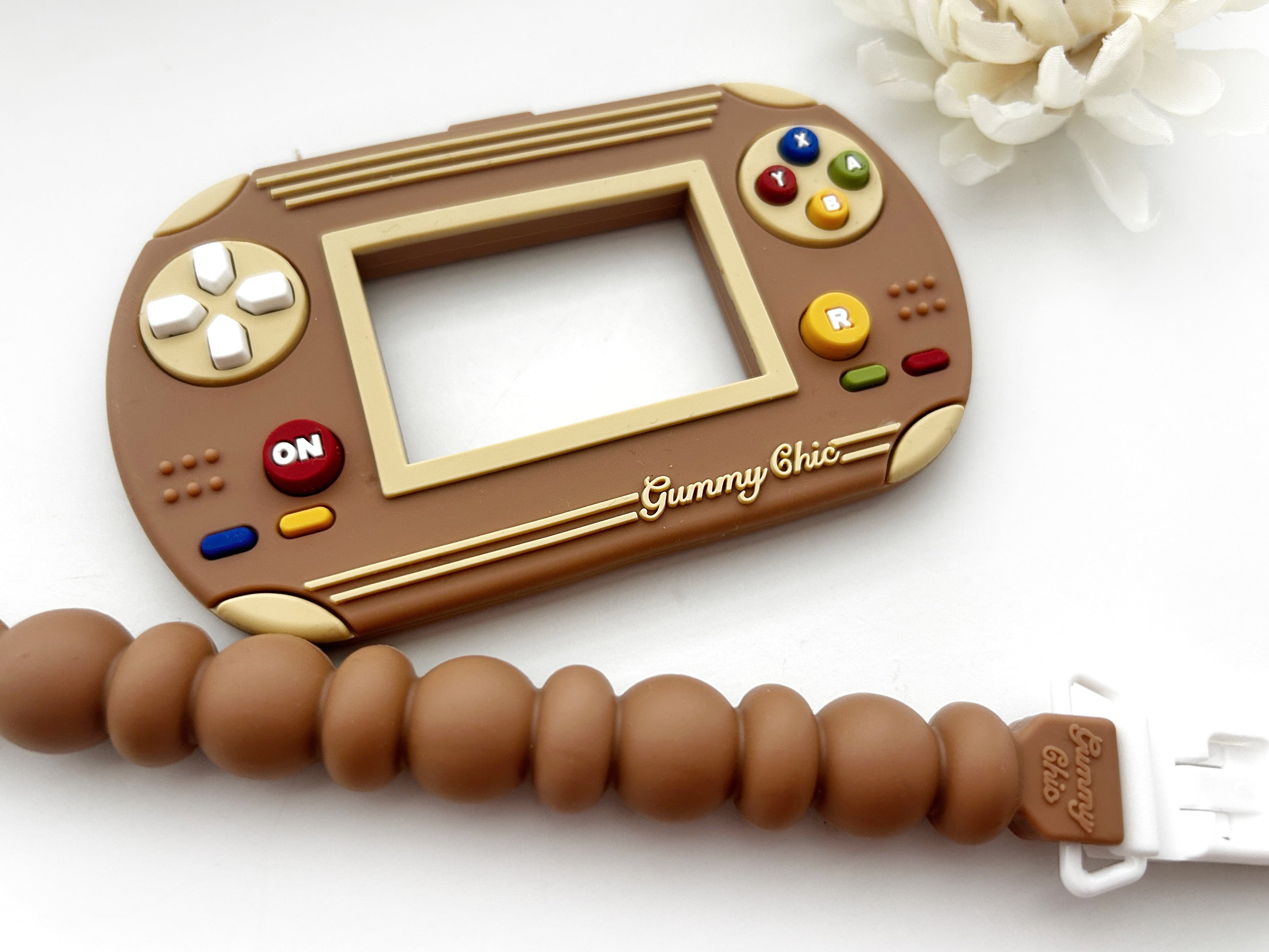 Gummy Chic Video Game Silicone Teether: Nostalgic & Safe Choice