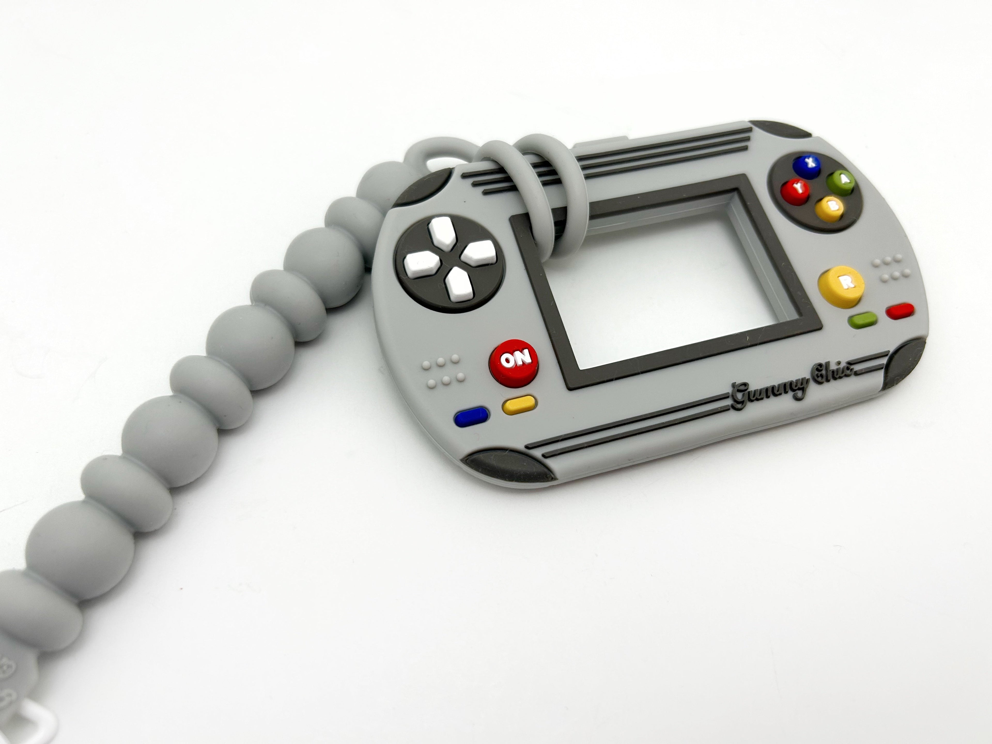 Gummy Chic Video Game Silicone Teether: Nostalgic & Safe Choice